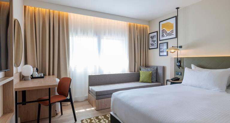 Comfortable Guest Room and Workspace