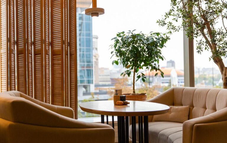 Interior of cozy luxury restaurant with original design and live plants 768x486